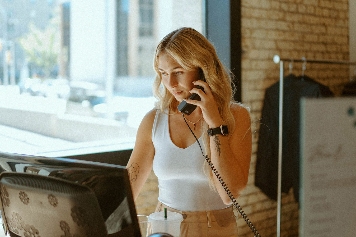 receptionist on phone